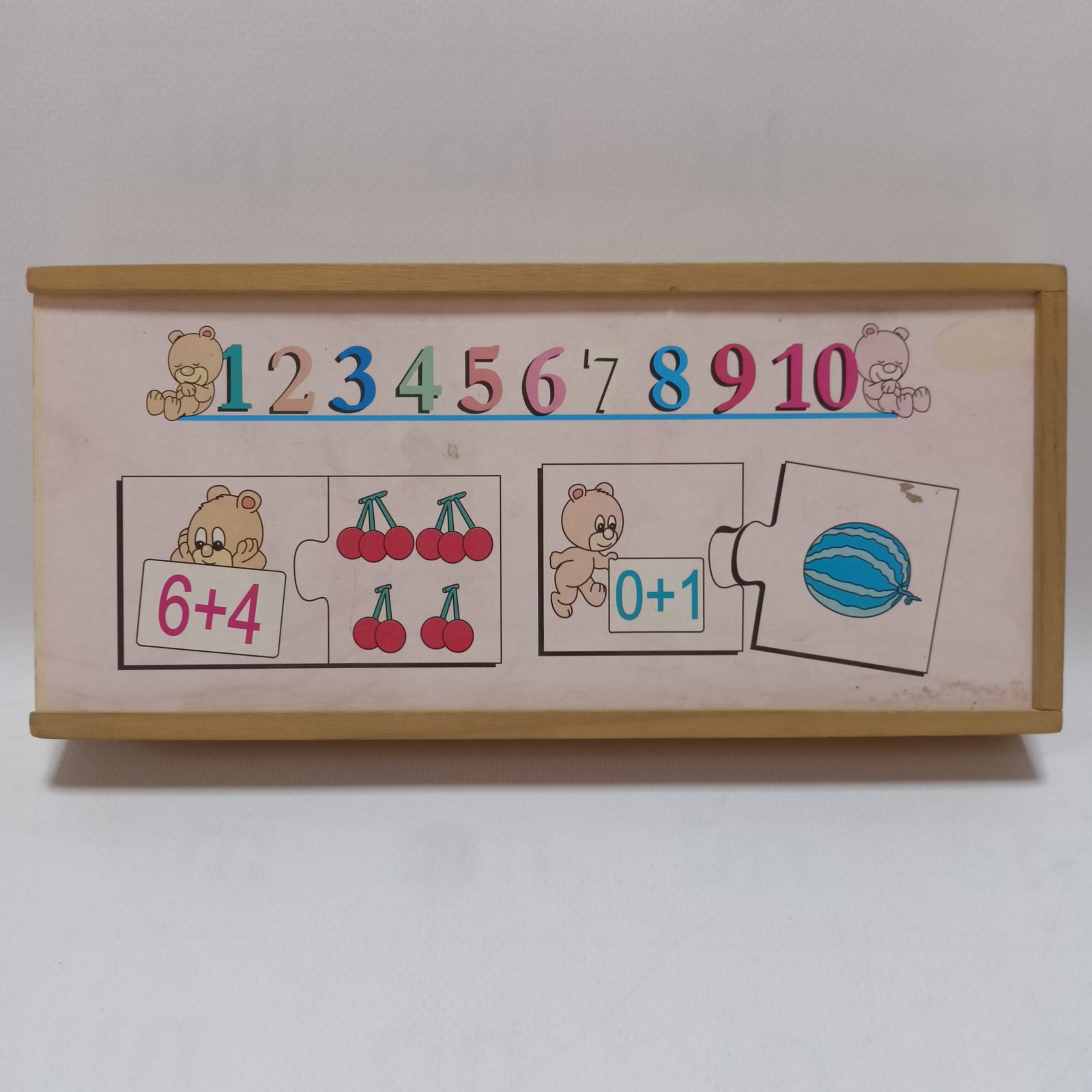 Wooden Numbers Puzzle Board – لوحة الأرقام الخشبية